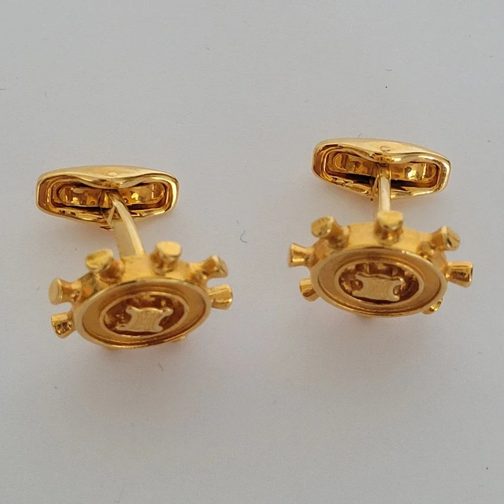 Celine Vintage Gold Tone Macadam Triomphe Ship Wheel Cufflinks Made in Italy